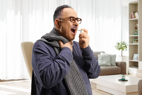 Mature Man Using Antiseptic Throat Spray Home — Stock Photo, Image