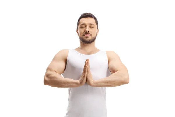Beyaz Bluzlu Kaslı Adam Beyaz Arka Planda Yoga Yapıyor — Stok fotoğraf