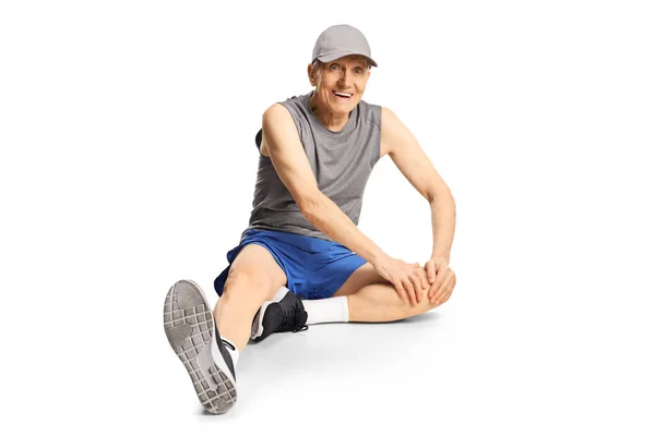 Elderly Man Sportswear Sitting Floor Stretching Isolated White Background — Stock Photo, Image