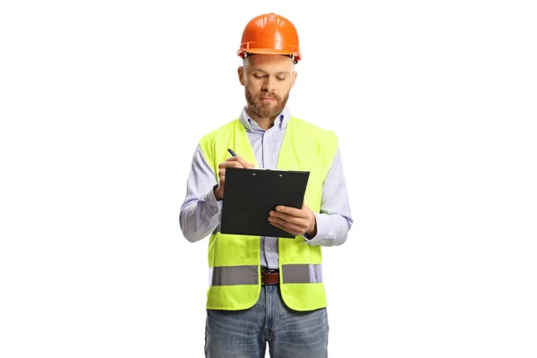 Ingeniero Masculino Con Chaleco Seguridad Sombrero Fuerza Escribiendo Documento Aislado —  Fotos de Stock