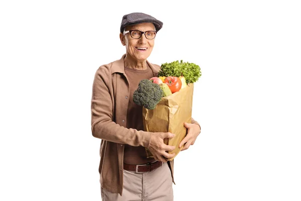 Elderly Man Holding Paper Bag Groceries Smiling Camera Isolated White — Stock Photo, Image