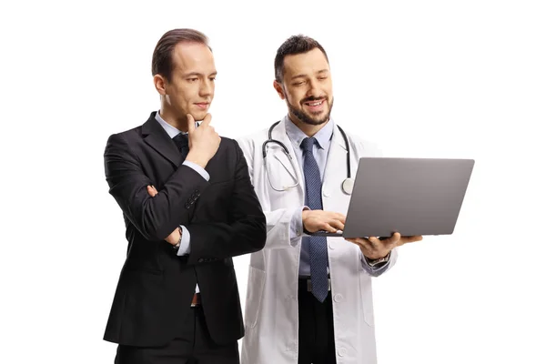 Pensive Businessman Doctor Looking Laptop Computer Isolated White Background — Stock Photo, Image