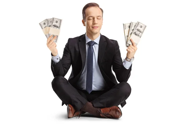 Podnikatel Meditace Držení Peněz Izolovaných Bílém Pozadí — Stock fotografie
