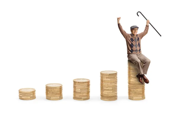 Elderly Man Sitting Tallest Pile Coins Gesturing Happiness Isolated White — Stock Photo, Image