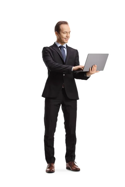 Full Length Portrait Businessman Working Laptop Computer Standing Isolated White — Stock Photo, Image