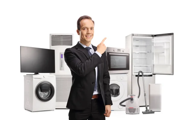 Empresário Apontando Para Eletrodomésticos Nas Costas Isolados Fundo Branco — Fotografia de Stock