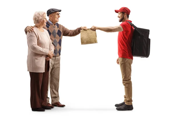 Full Length Profile Shot Guy Delivering Takeaway Food Bag Elderly — Stock Photo, Image