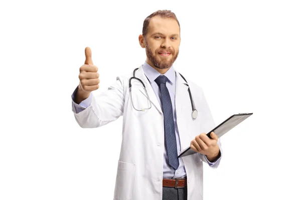 Young Male Doctor Holding Clipboard Showing Thumb Sign Isolated White — Stock Photo, Image