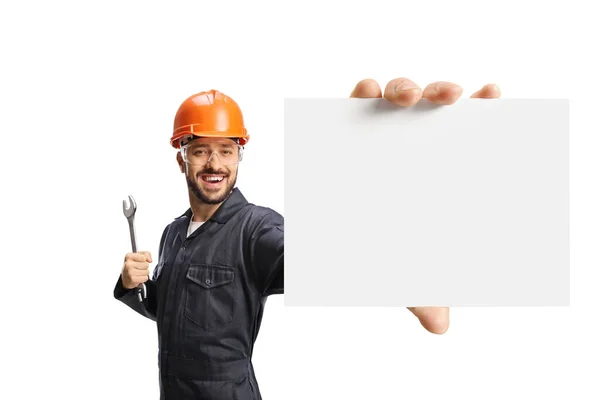 Worker Orange Helmet Holding Wrench Showing Blank Card Isolated White — Stock Photo, Image