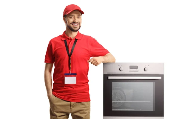 Male Shop Assistant Oven Smiling Camera Isolated White Background — стоковое фото