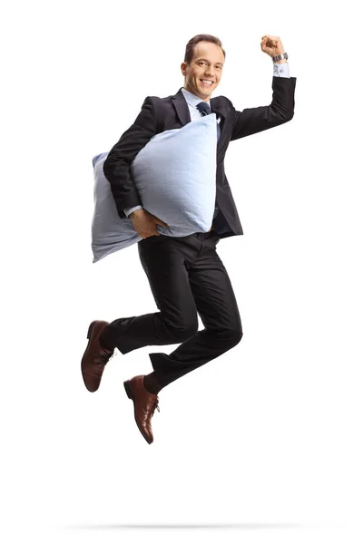 Full Length Shot Happy Businessman Holding Pillow Jumping Isolated White — стоковое фото