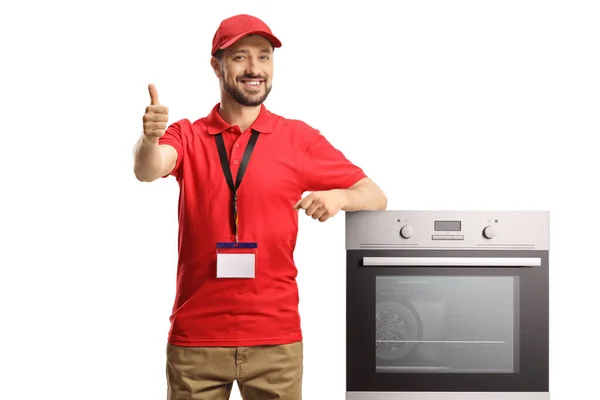 Man Winkel Assistent Met Een Oven Glimlachen Gebaren Duimen Omhoog — Stockfoto