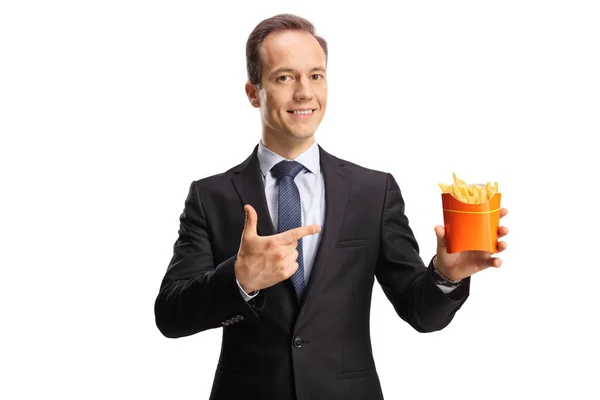 Affärsman Som Håller Pommes Frites Och Pekar Isolerad Vit Bakgrund — Stockfoto