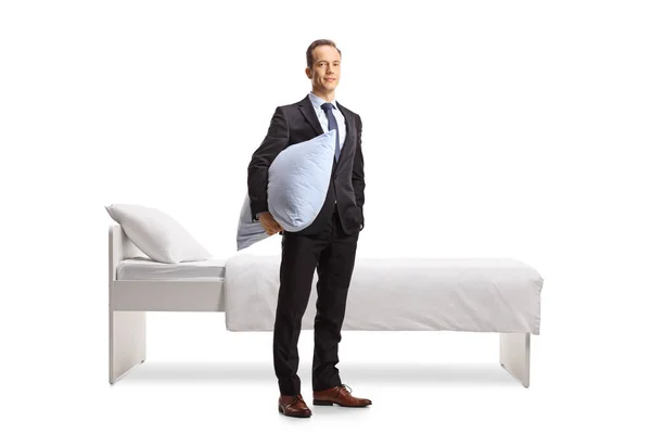 Businessman Holding Pillow Looking Camera Front Bed Isolated White Background — Photo