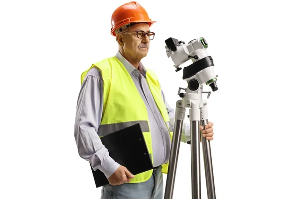 Geodetic Engineer Measuring Positioning Station Isolated White Background — стоковое фото