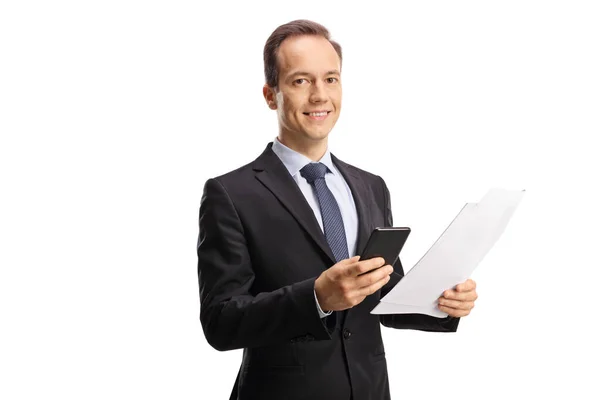Businessman Holding Mobile Phone Paper Document Looking Camera Isolated White — Stock fotografie