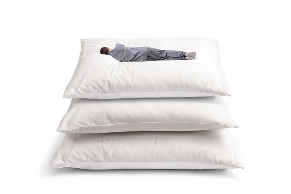 Rear View Shot Man Sleeping Pile Big Pillows Isolated White — Stok Foto