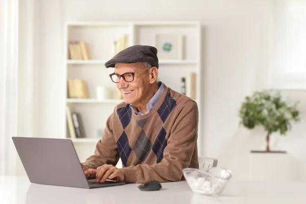 Happy Elderly Man Sitting Home Sofa Laptop Computer Table — стоковое фото