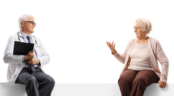 Full Length Shot Elderly Woman Talking Doctor Sitting Blank Panel — Stock Photo, Image