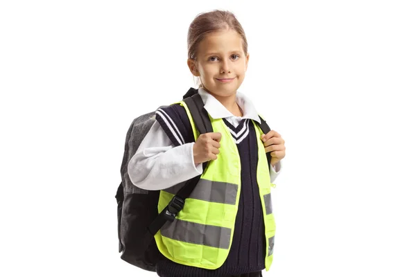 Mädchen Mit Schulrucksack Trägt Sicherheitsweste Auf Weißem Hintergrund — Stockfoto