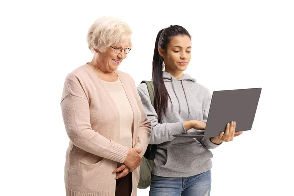Female Student Showing Laptop Computer Elderly Woman Isolated White Background — Zdjęcie stockowe