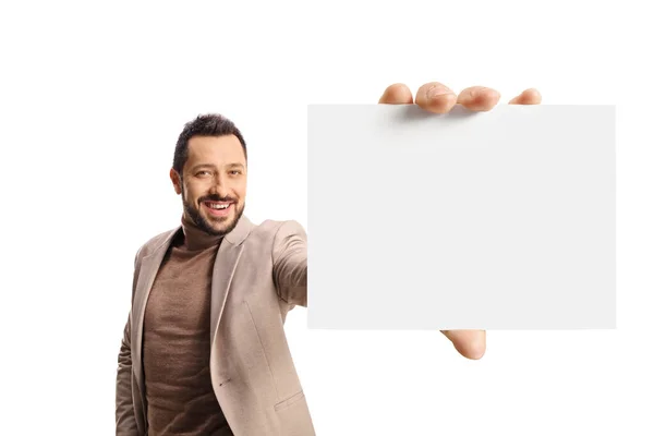 Smiling Young Man Holding Small Blank Cardboard Front Camera Isolated — Stok Foto