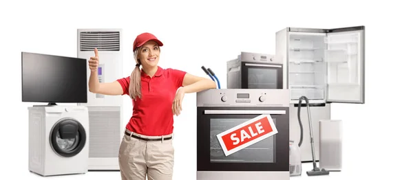 Female Shop Assistant Sale Store Electrical Appliances Gesturing Thumbs Isolated — Stockfoto