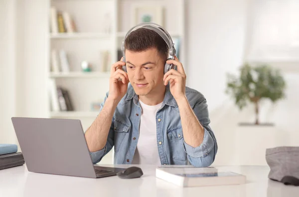 Young Man Sitting Home Laptop Computer Headphones Online Course — Foto Stock