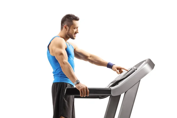 Fit Man Turning Treadmill Isolated White Background — Stok fotoğraf
