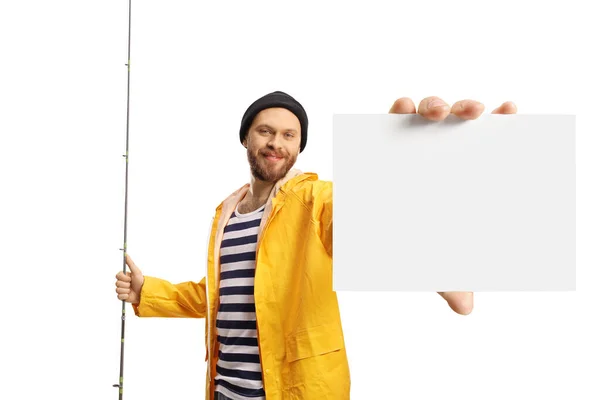 Smiling Fisherman Holding Fishing Rod Showing Blank Card Isolated White — Stock fotografie