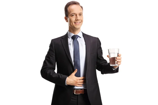 Geschäftsmann Hält Ein Glas Wasser Der Hand Und Lächelt Isoliert — Stockfoto