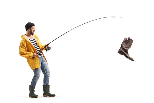 Full Length Profile Shot Fisherman Raincoat Catching Old Boot Fishing — Φωτογραφία Αρχείου