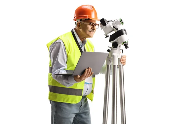 Geodetic Surveyor Measuring Positioning Station Holding Laptop Computer Isolated White — стоковое фото