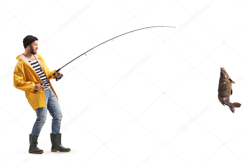 Fisherman atching a carp fish with a fishing rod isolated on white background
