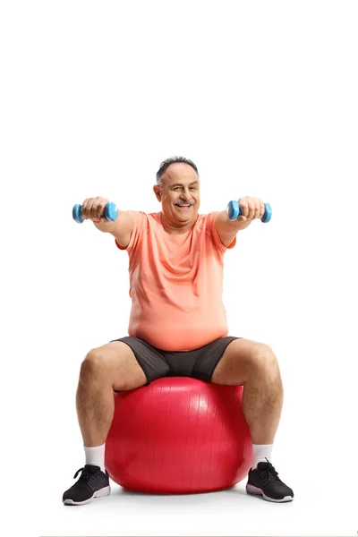 Hombre Maduro Feliz Ropa Deportiva Sentado Una Pelota Fitness Haciendo —  Fotos de Stock