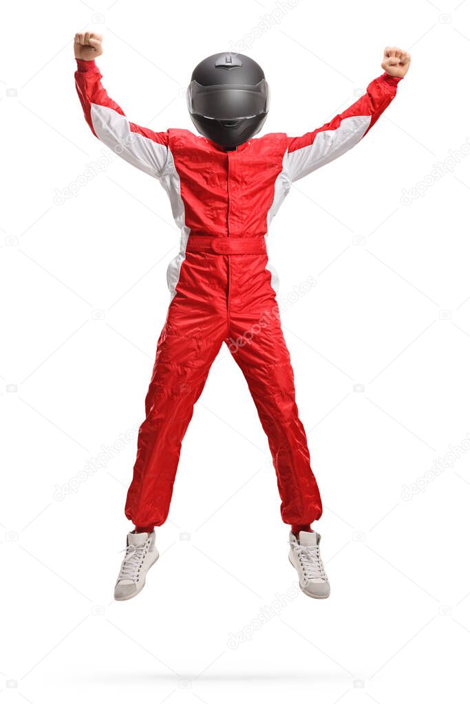 Full length portrait of a car racer with a helmet jumping and gesturing happiness isolated on white background
