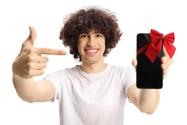 Casual Young Man Curly Hair Holding Smartphone Red Bow Tie — Stockfoto