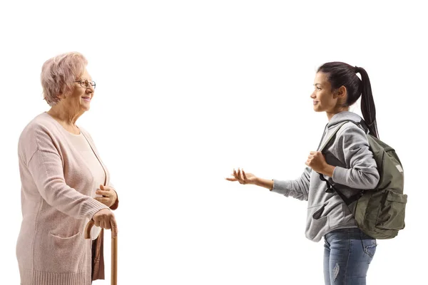 Studerande Pratar Med Äldre Kvinna Med Vandrande Käpp Isolerad Vit — Stockfoto