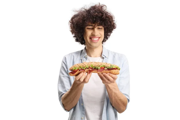 Young Man Curly Hair Holding Sandwich Isolated White Background — Stockfoto