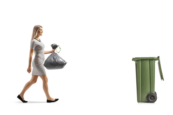 Full Length Profile Shot Young Woman Carrying Plastic Waste Bag — Stockfoto