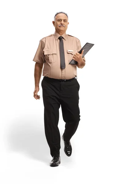 Plně Dlouhý Portrét Bezpečnostního Důstojníka Držícího Podložku Kráčejícího Směrem Kameře — Stock fotografie