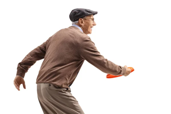 Profile Shot Elderly Man Playing Game Throwing Plastic Disk Isolated — Stockfoto