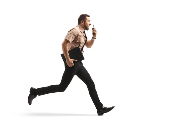 Full Length Profile Shot Security Guard Running Using Walkie Talkie — Stockfoto