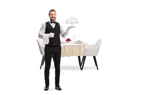 Waiter Holding Empty Cake Plate Front Table Isolated White Background — Stockfoto