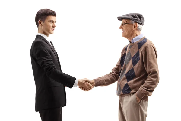 Profile Shot Young Guy Black Suit Shaking Hands Elderly Man — Stockfoto