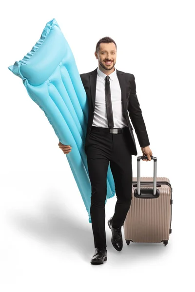 Businessman Carrying Water Floating Mattress Pullung Suitcase Isolated White Background — 스톡 사진