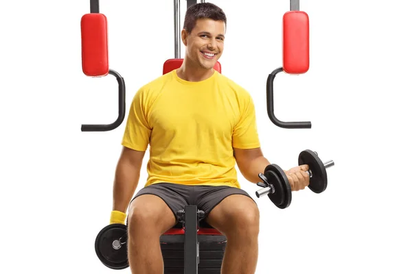 Young Man Exercising Weights Fitness Machine Looking Camera Isolated White — ストック写真