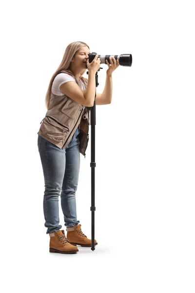 Full Length Shot Female Photo Journalist Using Camera Stand Isolated — Zdjęcie stockowe