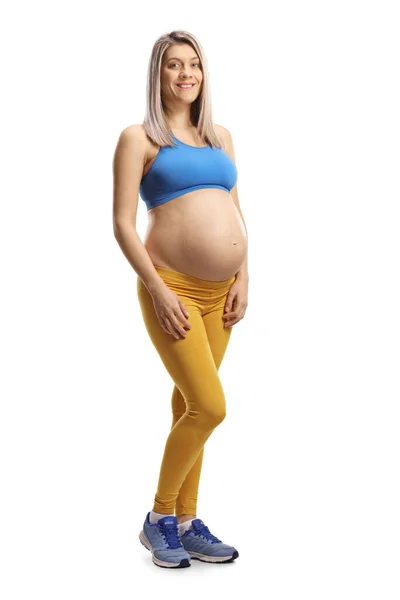 Full Length Portrait Pregnant Woman Blue Crop Top Yellow Leggings — Stok Foto