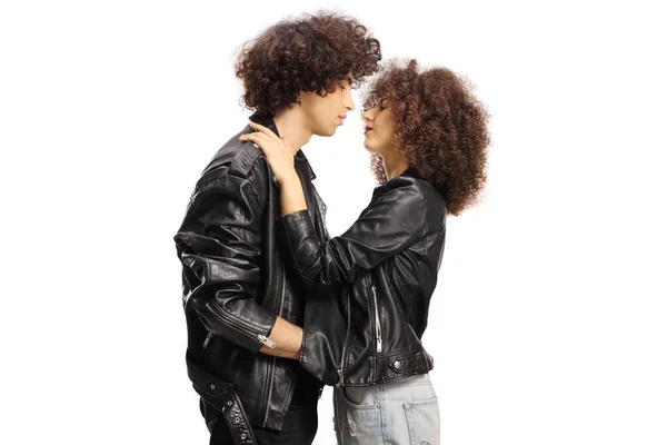 Young Couple Leather Jackets Hugging Looking Each Other Isolated White — Stockfoto